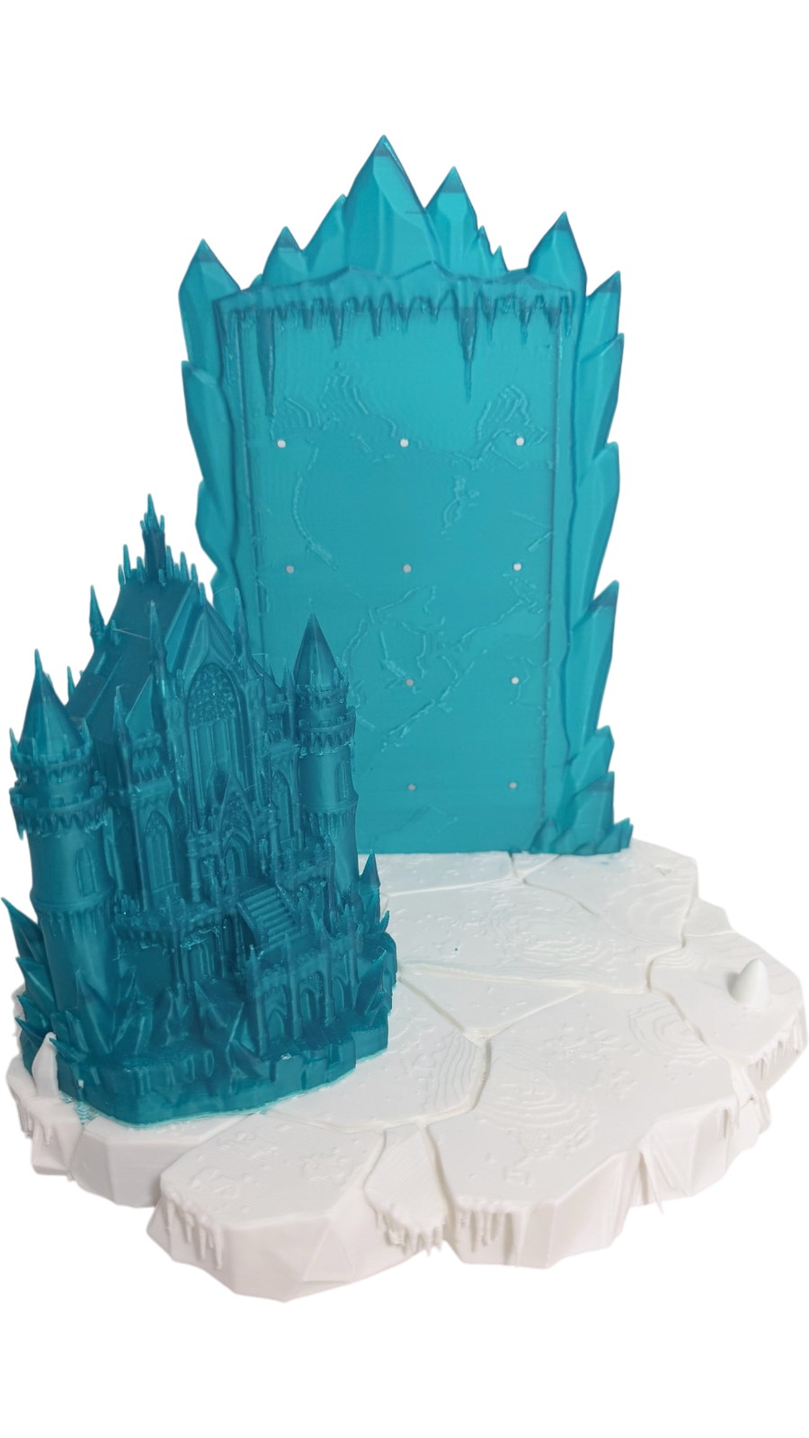 Graidan Collectibles 3D-printed blue ice castle pin display stand with a white snowy tundra base for enamel pins.