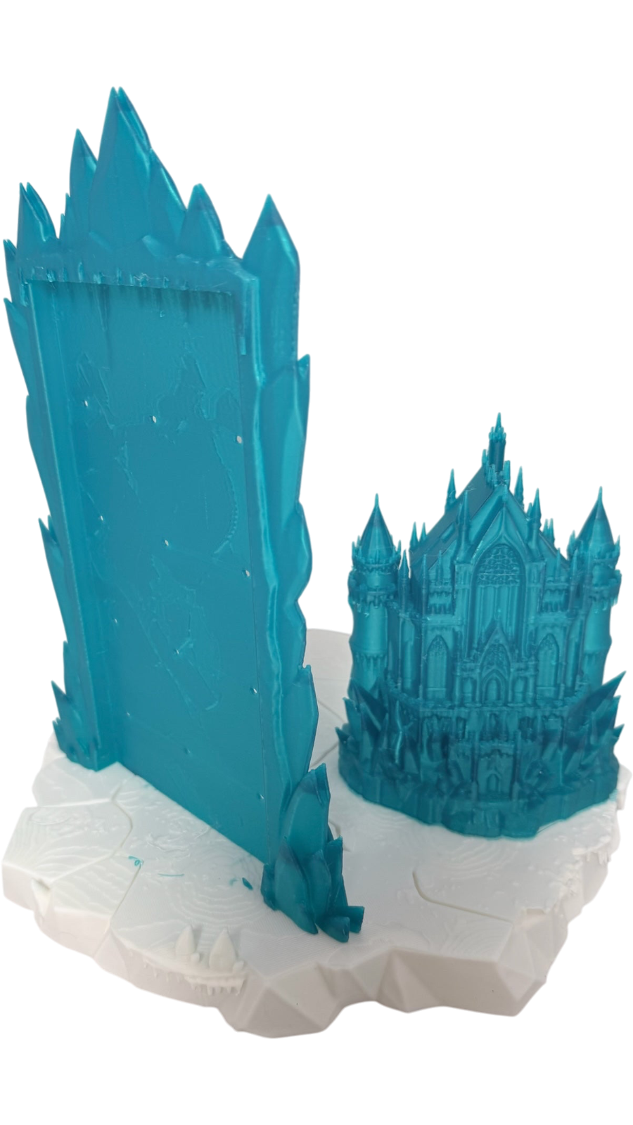 Graidan Collectibles 3D-printed blue ice castle pin display stand with a snowy white base for enamel pin collection.