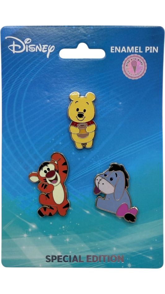 Graidan Collectibles Disney Winnie the Pooh, Tigger, and Eeyore enamel pin set on a blue special edition display card.